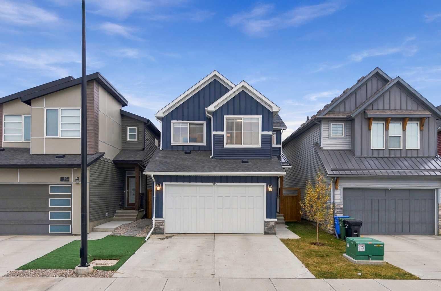 Property Photo: 680 Creekstone Circle SW AB T2X 4Y6