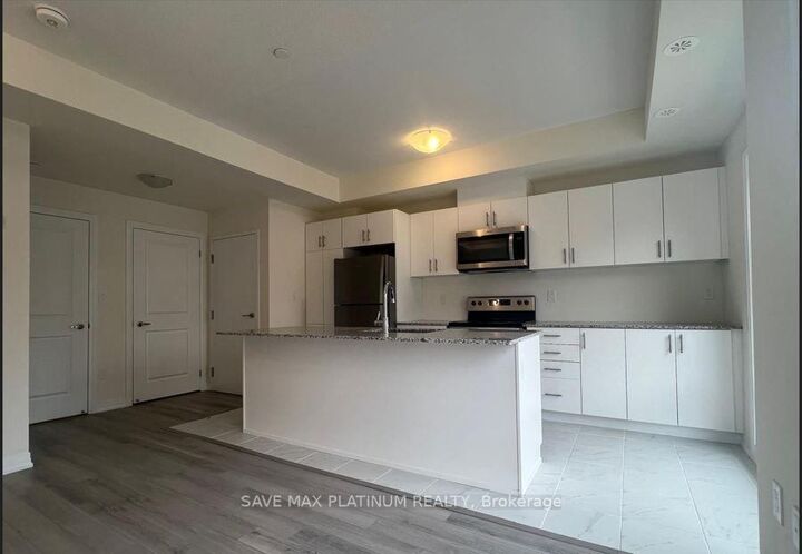 Property Photo:  165 Tapscott Road 08  ON M1B 0E8 