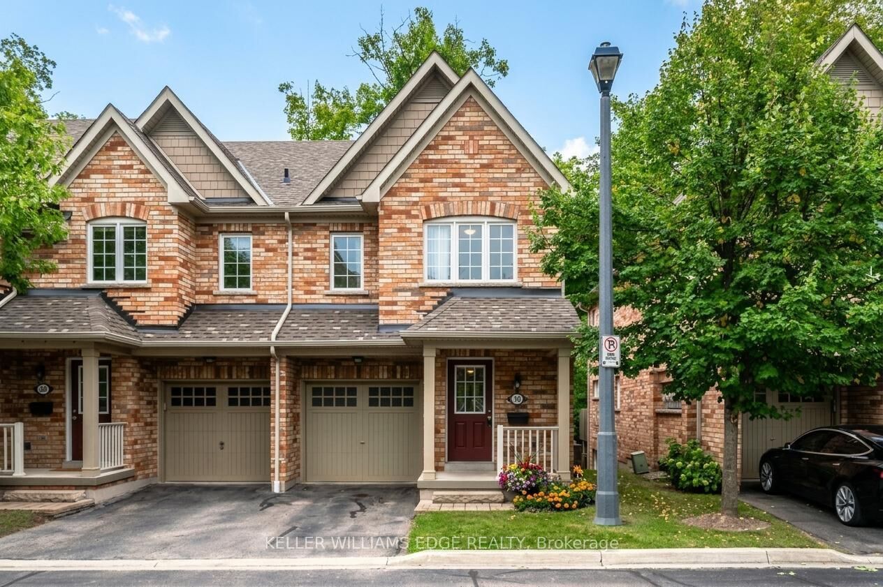 Property Photo:  233 Duskywing Way 30  ON L6L 0C5 