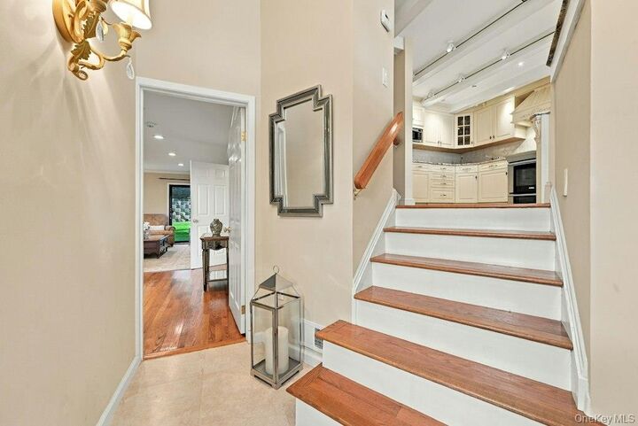 Property Photo:  8 Fairwind Court  NY 11768 
