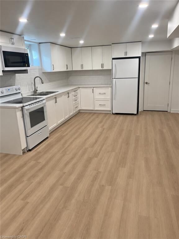 Property Photo: 42 Woodman Drive S Lower ON L8K 4E4