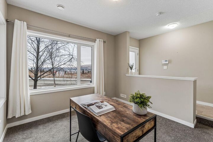 Property Photo: 501 River Heights Drive 500 AB T4C 2L3