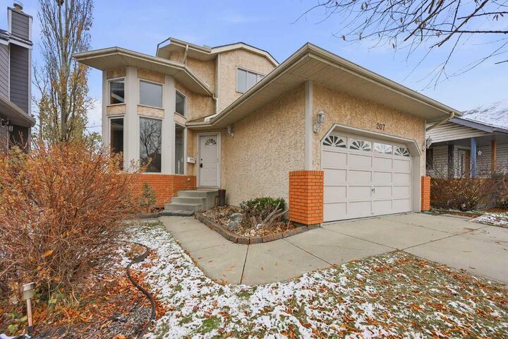 Property Photo:  207 Riverside Way SE  AB T2C 3V9 