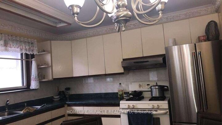 Property Photo:  122 Silverstone Drive  ON M9V 3G7 