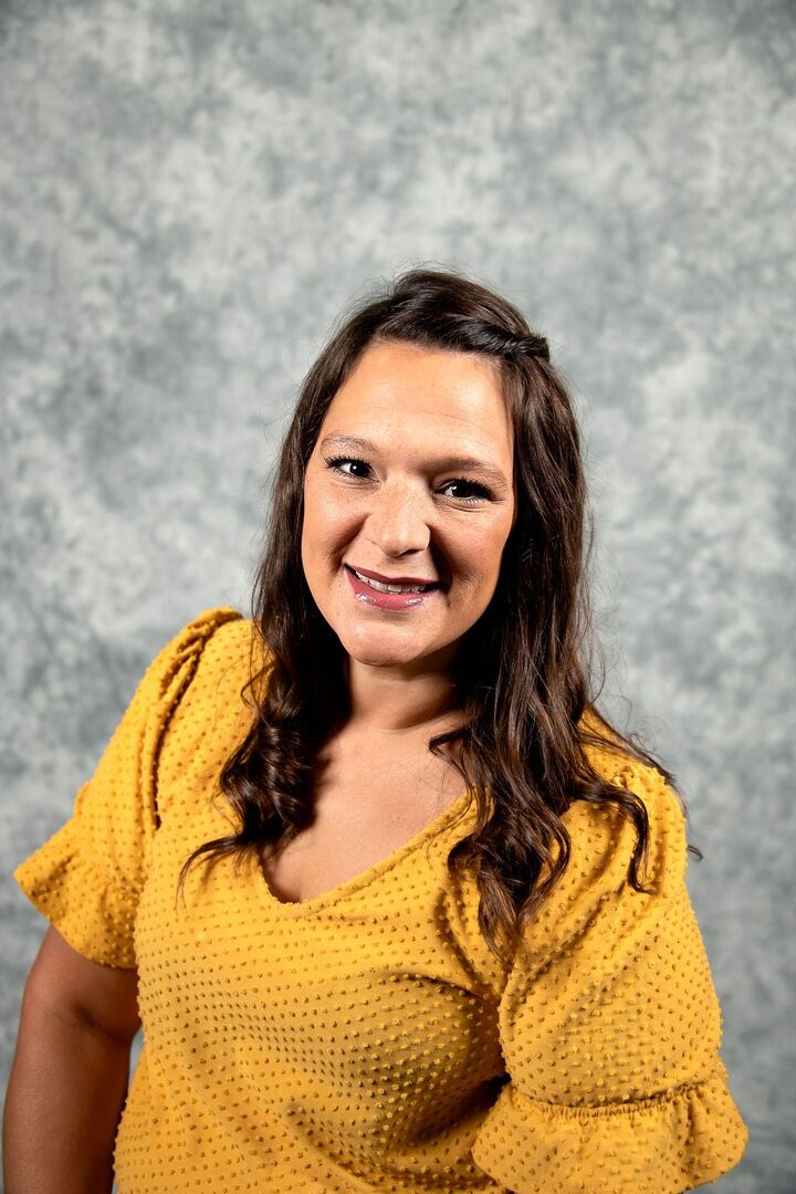 Kendra Kuhn,  in Central City, Action Holdings