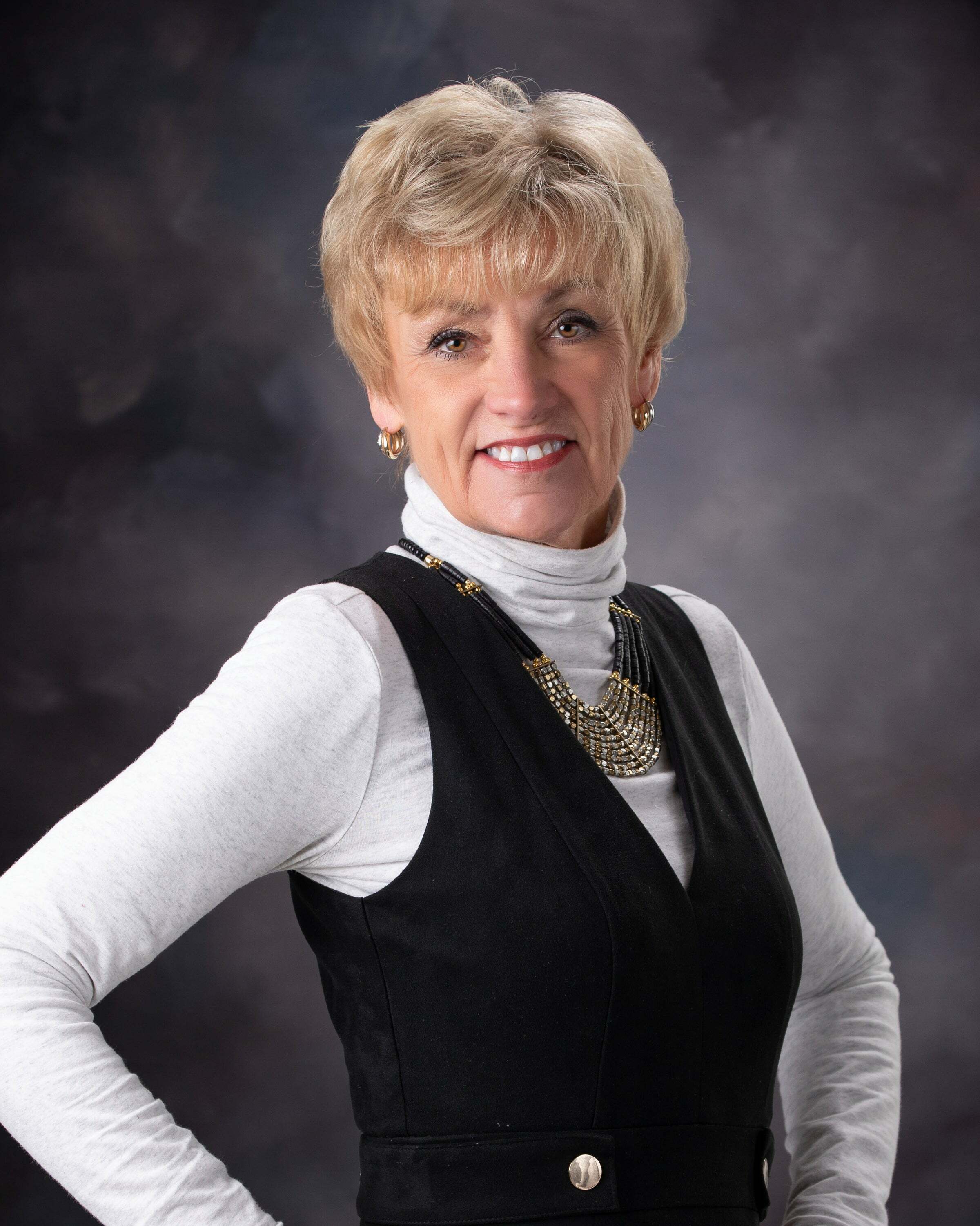 Judy Knuth, Real Estate Broker in Schofield, Action