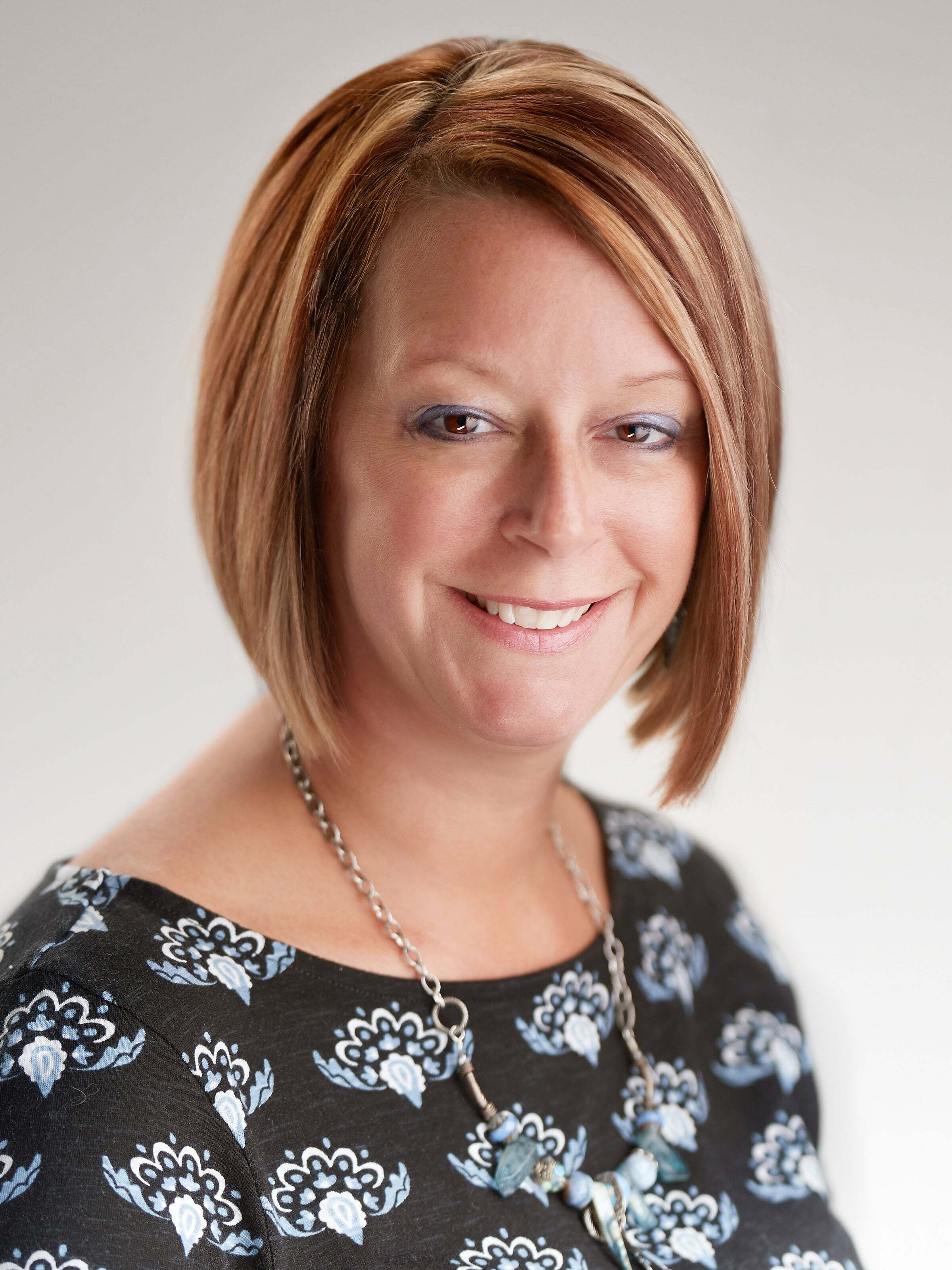 Julie Heniff-Bresnahan, Real Estate Salesperson in Schofield, Action