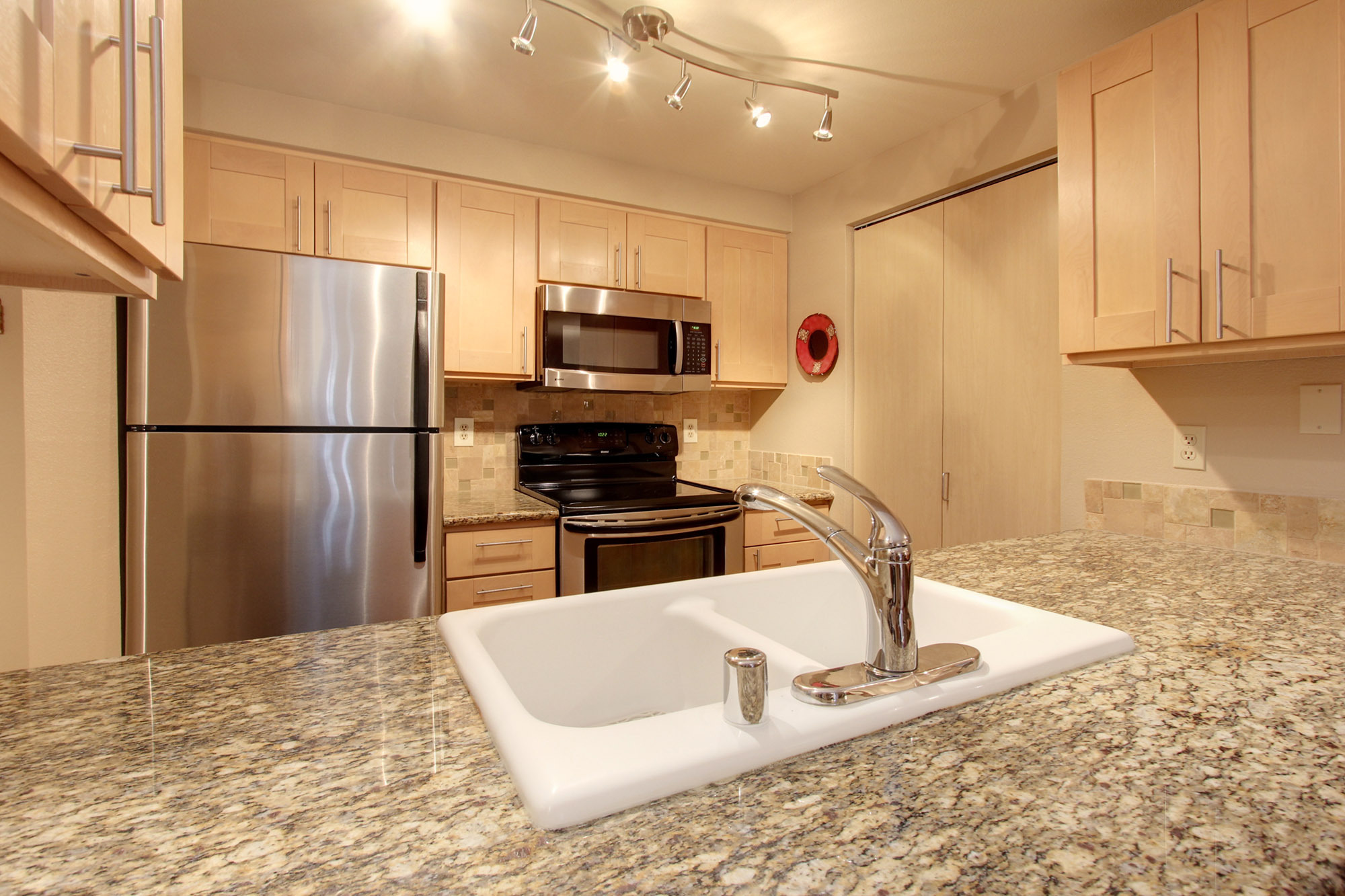 Property Photo: Kitchen 6960 California  Avenue SW A207  WA 98136 