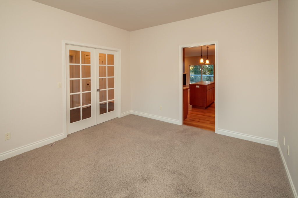 Property Photo: This is another view of the den showing the proximity to the kitchen and entry. 2815 Alderwood Ave  WA 98225 
